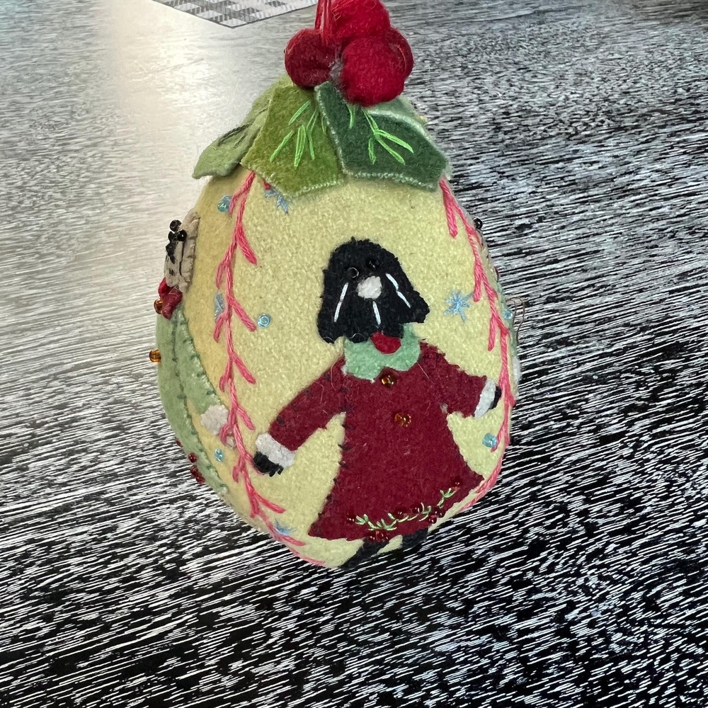 Felt‎ ornament with dogs stitched and beads
